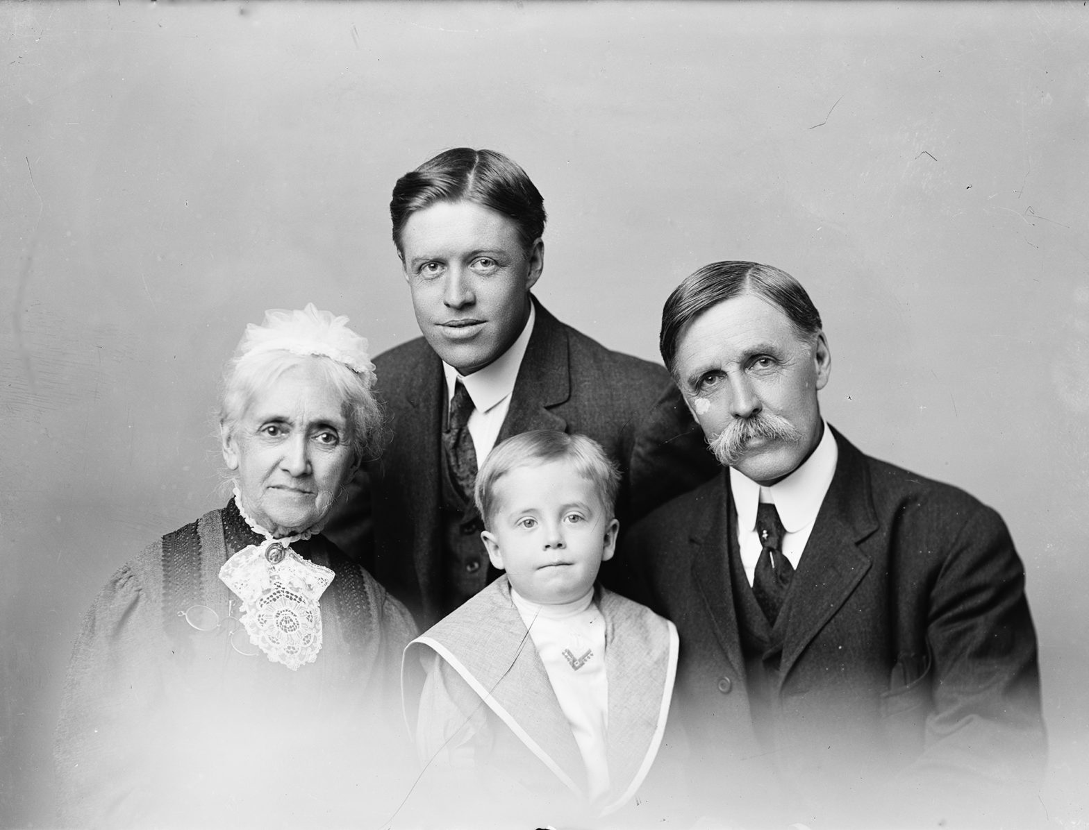 William Henry Jackson with his mother and sons in a family portrait, c. 1910